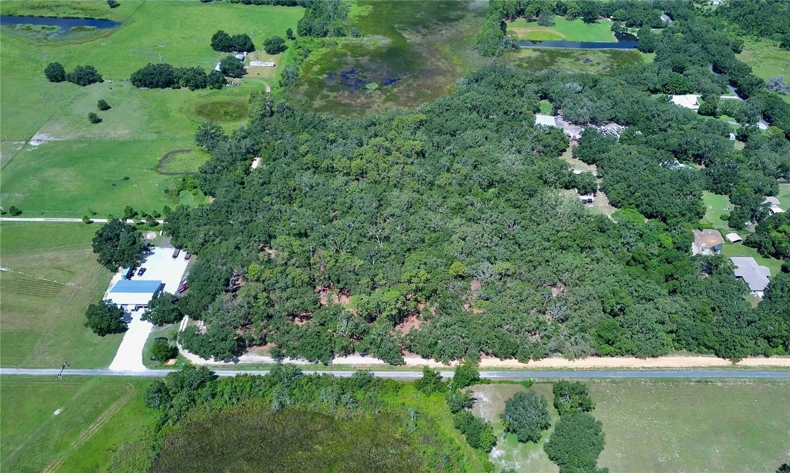***A SLICE OF FLORIDA HEAVEN*** Discover Your Dream--> tucked away on over 12 acres of peace & privacy in the heart of Florida!!! Welcome to your new homesite located in the charming city of Groveland!
This property is a rare find that offers peace, privacy, and limitless possibilities. It’s the perfect place to bring your dreams to life!
A wonderful location to build the dream home you've always wanted or to create a serene winter getaway in one of Florida’s best-kept secrets.
Located just 5 miles from Groveland and only a country drive to anything & everything that Florida has to offer, this property is a true example of real country living in one of the Sunshine State’s best-kept secrets.
Its excellent central location puts you close to everything you're looking for in the Sunshine State including State Parks, Pristine Beaches, and a multitude of shopping and business options.
Enjoy the serenity of country living while maintaining close proximity to everything you need!
Enjoy the best of both worlds—peaceful country living with convenient access to nearby towns and amenities.
There are also no restrictions or HOA's to contend with down the road giving you the freedom to bring your plans & ideas to life exactly as you envision them… Whether that dream is to build your dream home, create a serene winter getaway, or anything else your heart desires!
Florida living doesn't get much better!!!
Recent land clearing has been completed to make way for a new building site and driveway, saving you the time and expense at the start as you break ground and bring your vision to life. Several acres near the frontage road have been thoughtfully cleared while maintaining a diverse mix of topographical features which is now easily accessible via a brand-new gate for convenience.
Don’t Miss Out on This Rare Opportunity! Experience Florida living at its best!!!
Priced to sell and packed with potential, this lot is ready for your next chapter!
If this is what you’ve been looking for or you have any questions or would like more information, don’t hesitate—> Call Today!!!
***Attention: Google Maps & GPS Navigation may lead you the wrong way!!! Call for directions & instructions on viewing the property***
