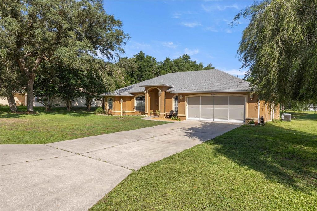 Photo of 10716 SW 53rd Circle, Ocala, FL 34476 (MLS # OM728010)