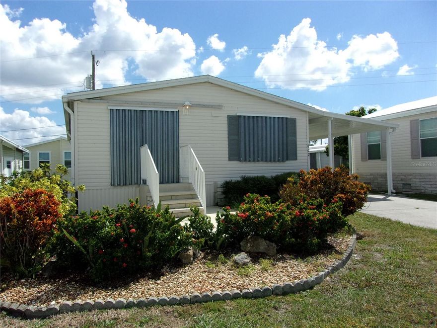 WONDERFUL 2 BEDROOM, 1 BATH DOUBLE-WIDE HOME WITH A CATHEDRAL CEILING, AN EAT-IN KITCHEN/DINING AREA, INSIDE WASHER/DRYER (STACKABLE), FANS, DISHWASHER, STORM SHUTTERS AND A PATIO, AND ATTRACTIVE, EASY TO MANAGE LANDSCAPING IN THE FRONT. SMALL PATIO IN FRONT AND SHED IN THE BACK. ON A NICE SHORT STREET WITH MINIMAL TRAFFIC. 
ENJOY THE FLORIDA LIFESTYLE, WITH ACCESS TO THE COMMUNITIES, INCLUDING TWO CLUBHOUSES, BOTH WITH FULL KITCHENS. ONE HAS A STAGE FOR THE MANY PRODUCTIONS, AND BANDS FOR ENTERTAINMENT AND DANCING. THE OTHER SITS ON THE WATERWAY WITH MANY DOLPHIN AND MANATEE SIGHTINGS. BOAT SLIPS AVAILABLE TO RENT, WITH EASY ACCESS TO THE INTRACOASTAL WATERWAY AND GULF. THERE IS A HEATED POOL AND HOT TUB, PICKLEBALL, CORNHOLE, SHUFFLEBOARD, A FITNESS CENTER, LIBRARY, SEWING ROOM, PING PONG, BILLIARDS. BOOK CLUB, POKER, BRIDGE, TRIVIA, BINGO, TOO MANY GROUPS TO MENTION. GOLF CART PARADES AND SCAVENGER HUNTS. EASY ACCESS TO SHOPPING, BEACH, HISTORIC DOWNTOWN VENICE. ACCESS TO TRAIL, FOR WAKING OR RIDING YOUR BIKE.