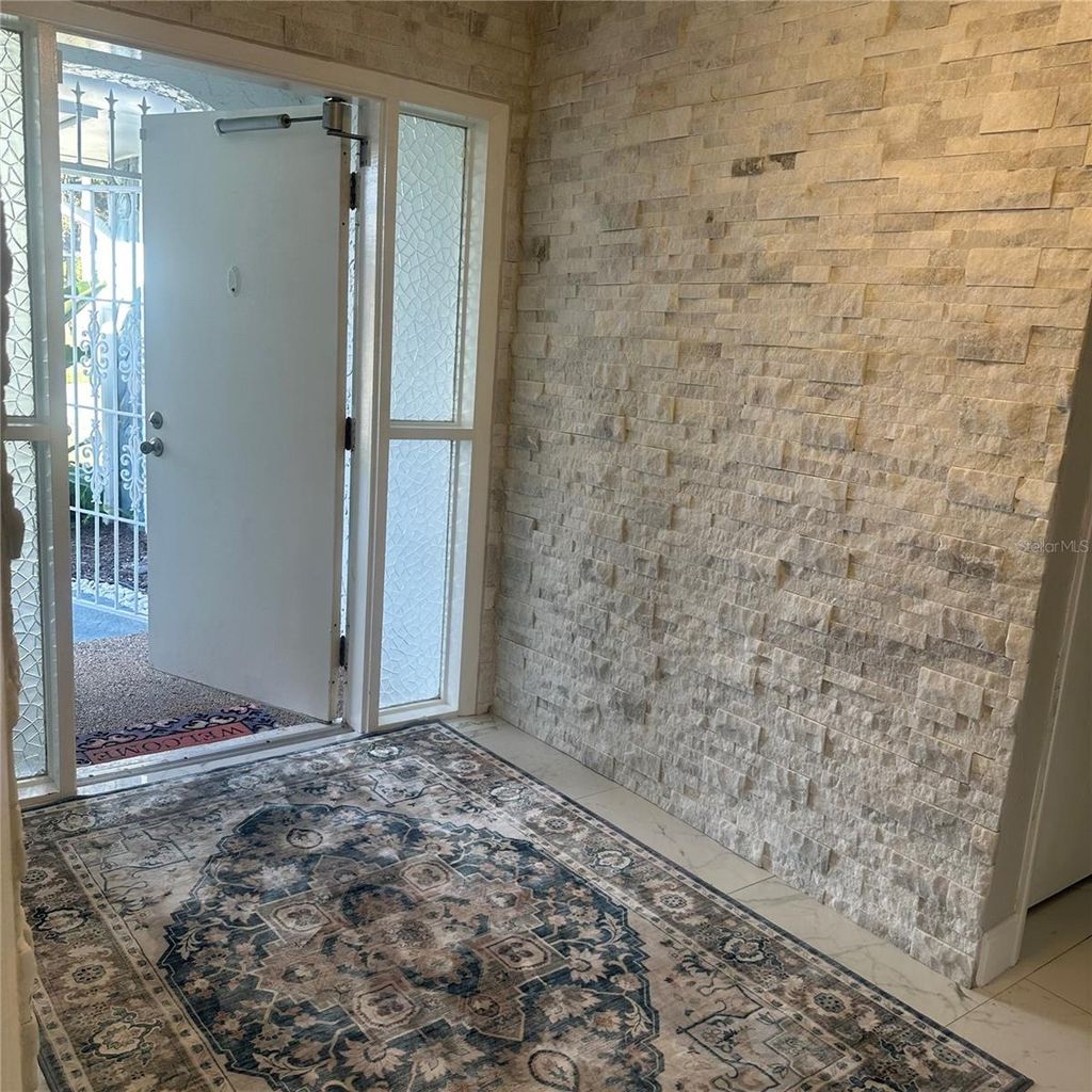 Photo of 7100 Scruboak Lane, Orlando, FL 32818 (MLS # O6374356)
