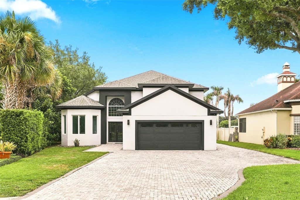 Photo of 673 Lake Harbor Circle, Orlando, FL 32809 (MLS # O6430349)