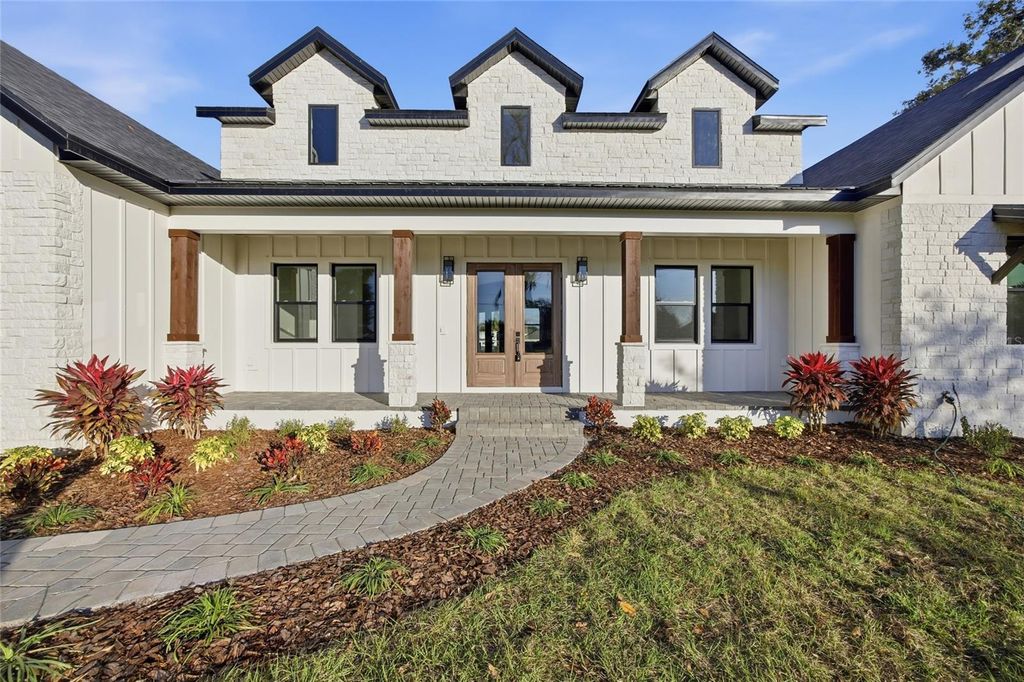 Photo of 3110 Charlie Taylor Road, Plant City, FL 33565 (MLS # TB8463954)