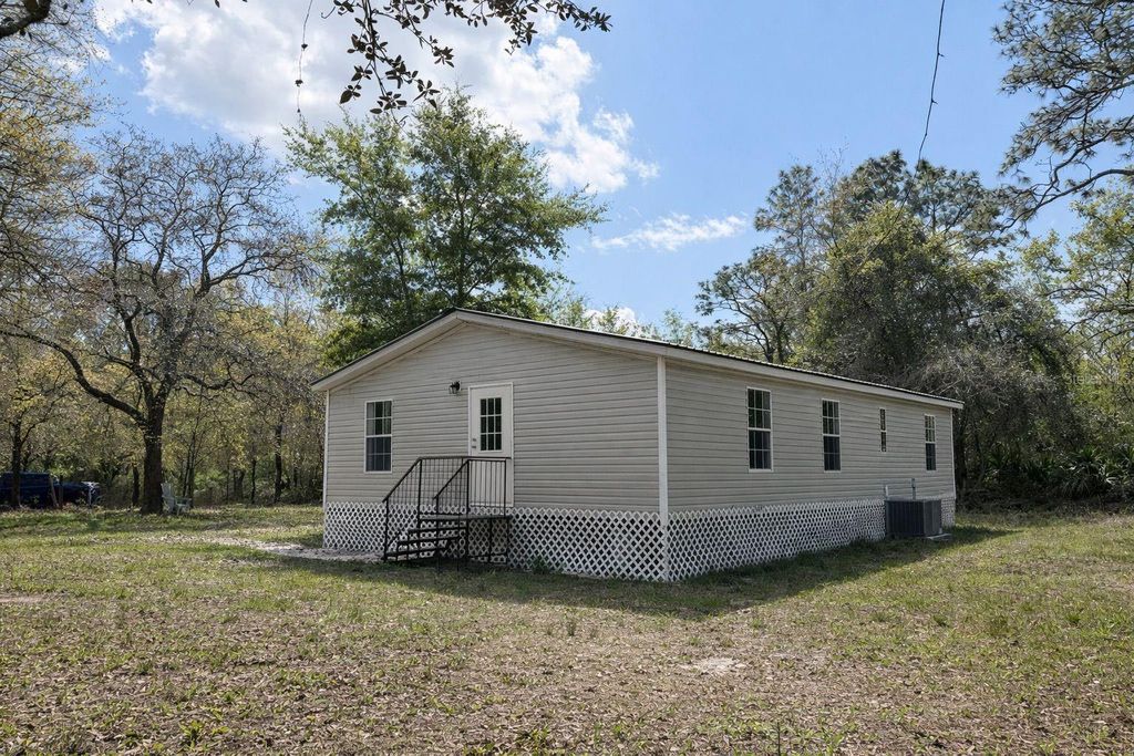 Photo of 10405 Jungle Street, New Port Richey, FL 34654 (MLS # TB8471121)