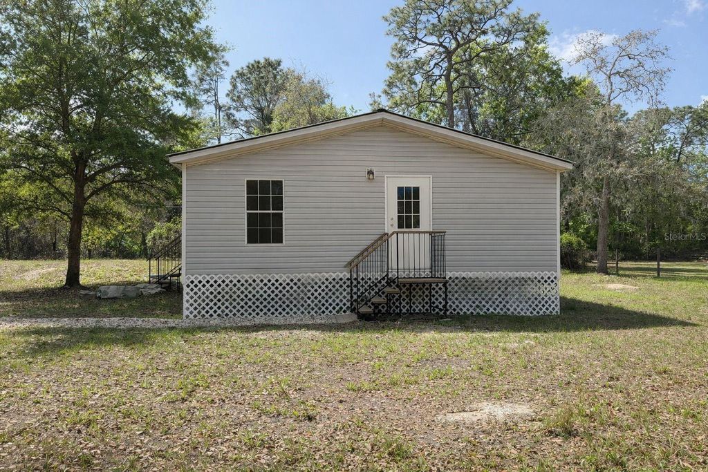 Photo of 10405 Jungle Street, New Port Richey, FL 34654 (MLS # TB8471121)