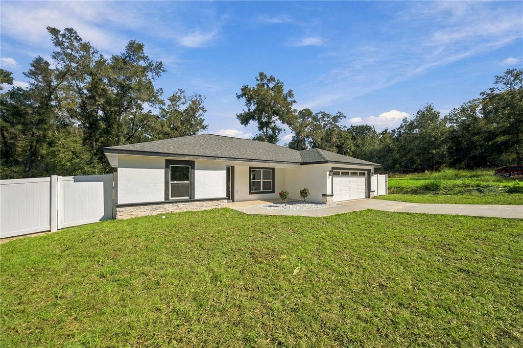 Photo of 3969 SE 140th Place, Summerfield, FL 34491 (MLS # OM734025)