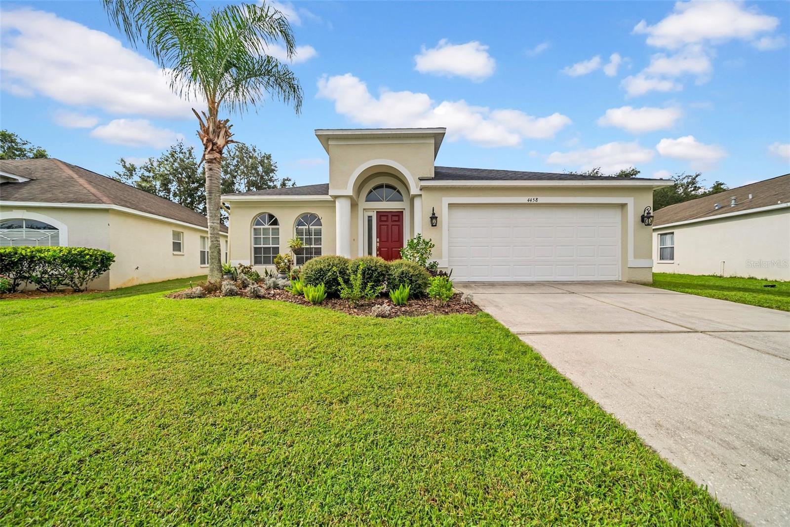Set inside the gated golf community of Hernando Oaks, this move in ready four bedroom, two bath home blends bright natural light with an easy flowing layout. A new roof in 2023, a two car garage, and wood look luxury vinyl flooring throughout set the tone for low maintenance living with style.
A welcoming foyer opens to a sunlit living and dining space that feels open and inviting. Continue to the large great room where the kitchen, casual dining, and family room come together for effortless everyday living. The updated kitchen offers granite counters, a breakfast bar with pendant lighting, upgraded stainless steel appliances, abundant cabinetry, and a convenient coffee bar. Vaulted ceilings and ceiling fans keep everything comfortable.
The private primary suite features its own vaulted ceiling, a walk in closet, and direct access to the covered patio. The bath feels spa like with a dual granite vanity, soaking tub, glass enclosed tiled shower with a rain showerhead, and a private water closet. Three additional bedrooms are well sized and share a full bath with a dual granite vanity and updated lighting.
Slide open the doors to a covered back patio and relax with peaceful views of nature. It is an ideal spot for grilling, morning coffee, or unwinding after a round.
Hernando Oaks is golf cart friendly and home to an 18 hole course, perfect for anyone who loves the game or the lifestyle. Everyday essentials are minutes away, and weekend fun is close by at Weeki Wachee Springs and the Gulf beaches.