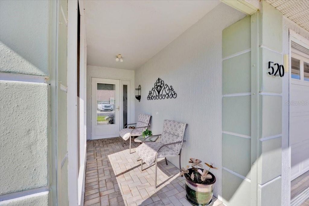 Photo of 520 Sweetwater Way, Haines City, FL 33844 (MLS # O6367395)