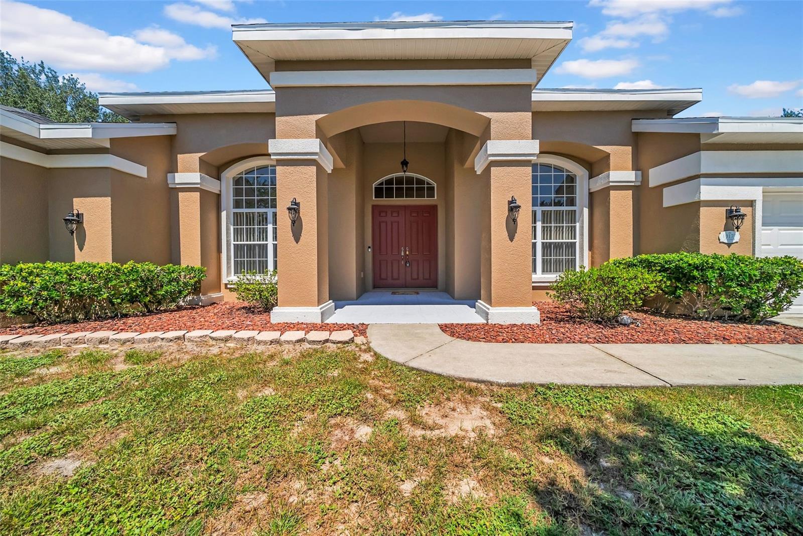Stunning 4-Bed, 3-Bath Home on Half Acre in Spring Hill!
This beautifully updated block-constructed home offers nearly everything on your wish list—set on a spacious ½-acre lot with low HOA fees and no CDD. Inside, you’ll find new luxury vinyl flooring, soaring 12’ vaulted ceilings, elegant tray ceilings with crown molding, generously sized guest rooms, and a flex room with French doors. The split floor plan includes a luxurious primary suite with a sitting room, patio access, and spa-style bath.
Major upgrades bring peace of mind with a new roof (Jan 2025), two new A/C units (May 2024), and a central vacuum system. Enjoy an oversized 3-car garage, an enclosed patio perfect for year-round use, and space for entertaining or quiet living.
Move-in ready and loaded with upgrades—this is the one you’ve been waiting for. Schedule your private showing today!