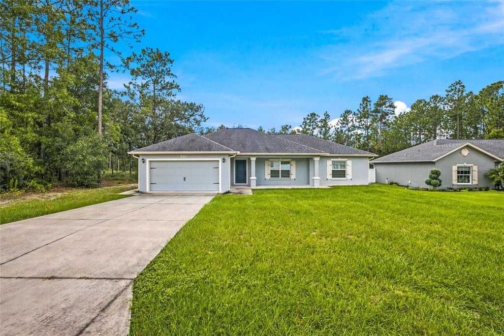 Photo of 13152 SW 65th Circle, Ocala, FL 34473 (MLS # OM731023)