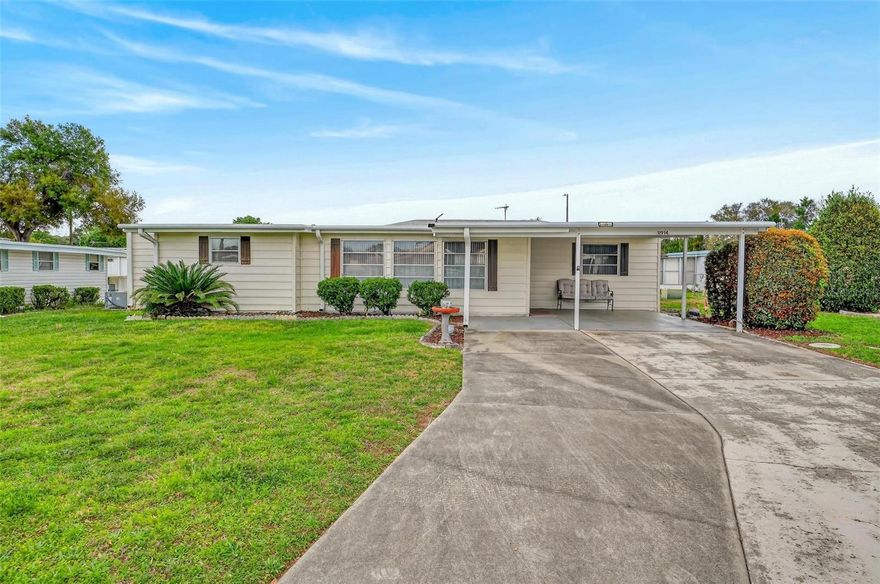 Perfectly positioned in the highly desirable community of Imperial Terrace West, this 3-bedroom, 2-bathroom home combines a thoughtful layout with everyday practicality. The interior features expansive living areas, including an oversized Florida room with ample windows for natural sunlight and a versatile additional bedroom/den/hobby room. A split floor plan strategically separates the bedrooms to enhance privacy. At the heart of the home, the bright, functional kitchen boasts a built-in oven, built-in microwave, a closet pantry, and a convenient breakfast bar for casual dining. The property offers ample storage both inside and out, including two sheds-one of which is equipped as a laundry room and conveniently accessible through the enclosed rear porch. Outside, a generous double carport provides shaded parking, offering the perfect spot for your golf cart! HOA/COMMUNITY: Imperial Terrace is a highly desirable 55+ retirement community offering AMENITIES galore! Community amenities include a clubhouse, boat slips, Harris Chain of Lakes access, shuffleboard courts, an indoor pool and hot tub, and so much more! Featuring a low HOA fee and NO LOT RENT - you OWN the land! Imperial Terrace is located off Hwy 441, just minutes from shopping, dining, entertainment, state-of-the-art medical facilities, PLUS, renowned local destinations - Mount Dora and The Villages! Easily commute to the beach coasts, Orlando attractions, airports and everywhere exciting that makes Floridians love living ‘central’ in the Sunshine State, year ‘round or seasonal. Call to schedule your personal tour today!