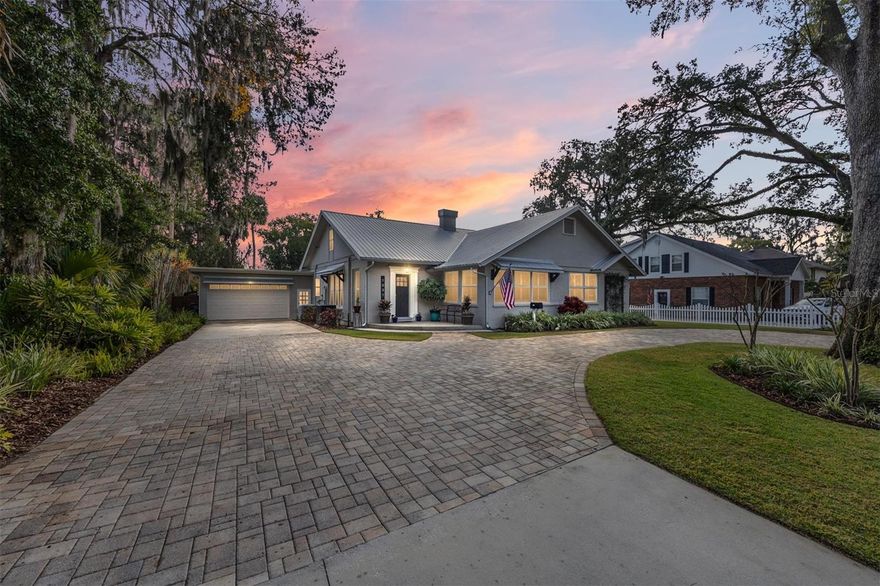 Located in a highly sought-after SE neighborhood just minutes from downtown, this exceptional 1955 completely updated residence is a rare opportunity to own a truly distinctive home. Timeless details abound, including original red oak floors, bold crown molding, elegant wainscoting, and plantation shutters throughout. The welcoming foyer features built-in bookcases and leads to a spacious family room and a sun-filled office/sunroom offering beautiful natural light.

The main level hosts three bedrooms and two and a half baths, including an oversized primary suite with a sitting area overlooking the lush backyard. The open kitchen is designed for both function and style with dual sinks (one with reverse osmosis), a butler’s pantry area, oversized pantry, and a bright breakfast room, all complemented by a formal dining space ideal for entertaining.

Upstairs, you’ll find a spacious fourth bedroom with a full bath that also serves perfectly as a bonus or theater room.Step outside to your private backyard oasis—sip coffee or enjoy dinner while listening to the waterfall in the saltwater pool. With a newly installed pool heater and chiller, it’s ready for year-round enjoyment. Evenings are magical around the gas fireplace, surrounded by lush landscaping, market lights, and total serenity.

Filled with timeless charm and architectural distinction, this remarkable home offers a rare blend of character, comfort, and location. Opportunities like this are seldom available—this is truly a must-see property that won’t last long.