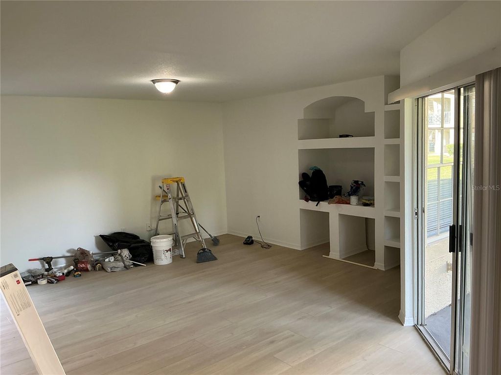 Photo of 7350 Westpointe Boulevard #213, Orlando, FL 32835 (MLS # O6362496)