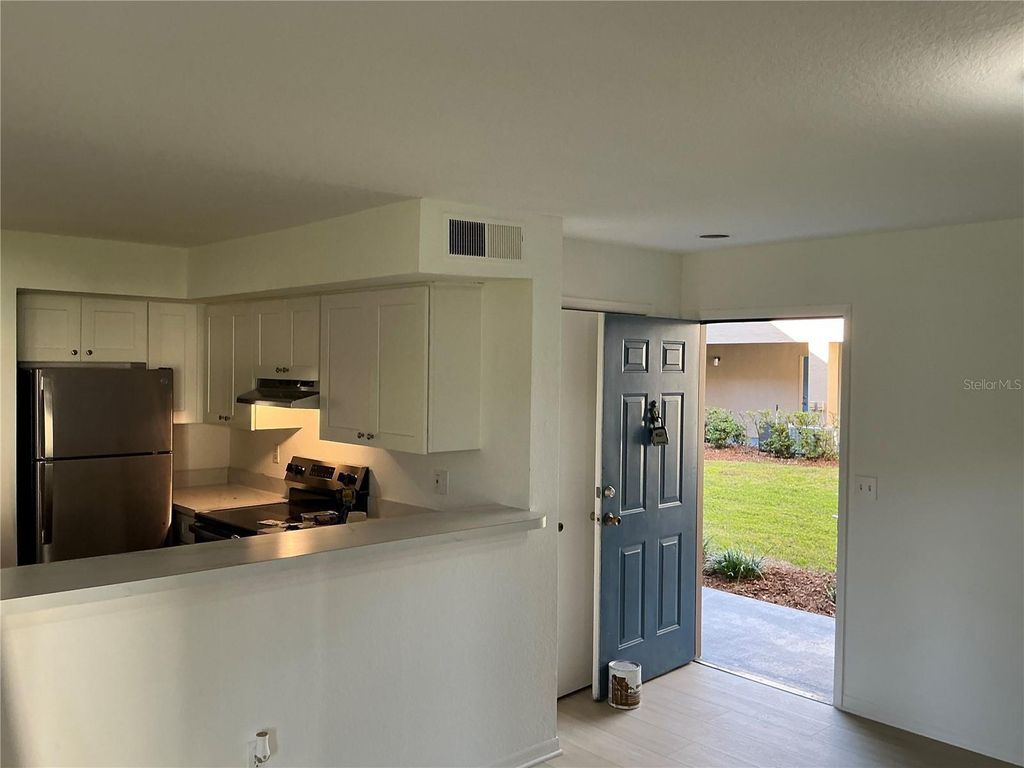 Photo of 7350 Westpointe Boulevard #213, Orlando, FL 32835 (MLS # O6362496)