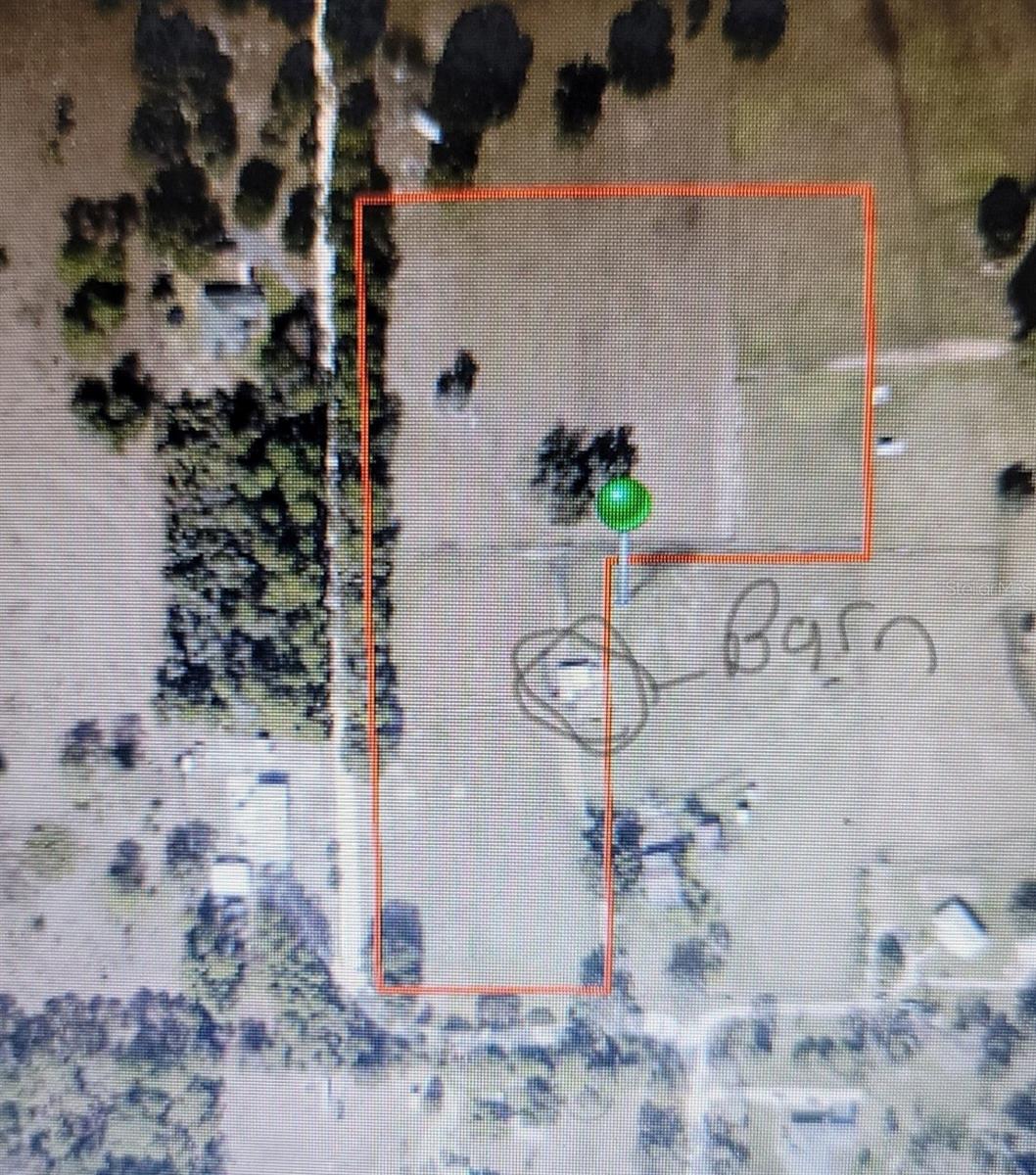 Rare just under 6 prime acres of cleared land ready for you. All fenced with barn/stable on property. Great location, high and dry no wet lands and not in a flood zone. All information is intended to be accurate but is not guaranteed