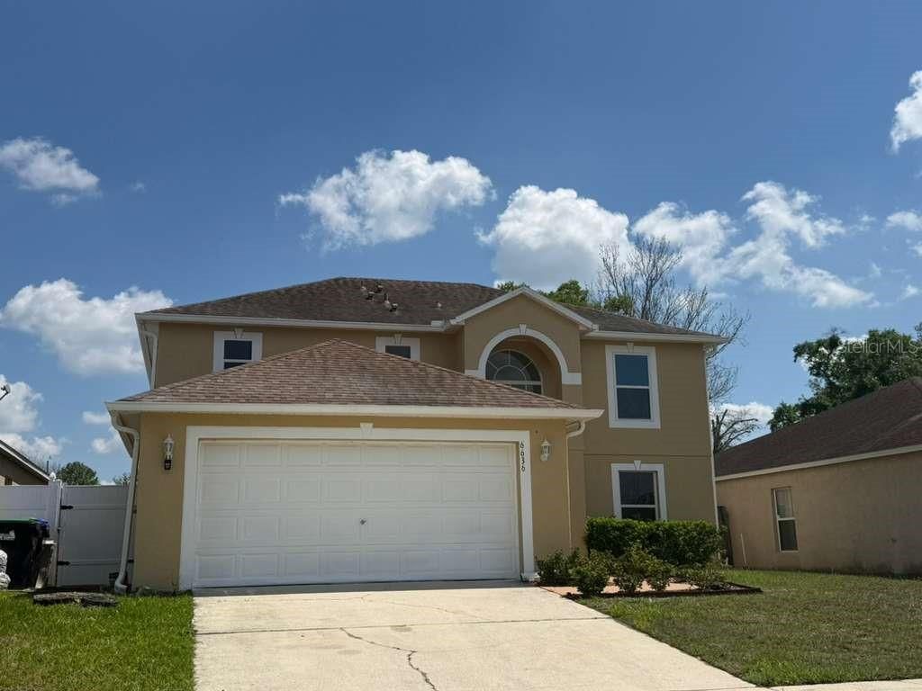 Photo of 6636 Pomeroy Circle, Orlando, FL 32810 (MLS # O6394909)