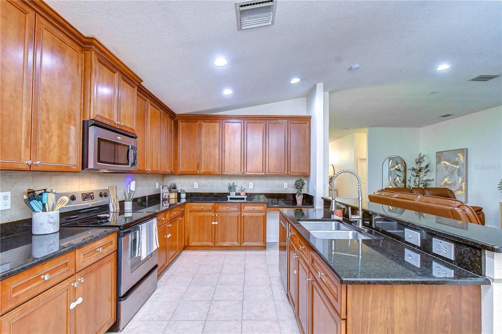 Photo of 3746 Olde Lanark Drive, Land O Lakes, FL 34638 (MLS # TB8524444)