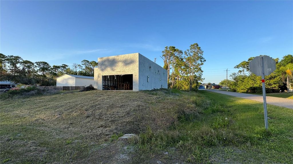 Photo of 5182 Hopkins Avenue, Port Charlotte, FL 33981 (MLS # C7525721)