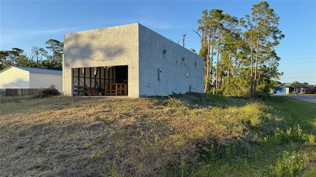 Photo of 5182 Hopkins Avenue, Port Charlotte, FL 33981 (MLS # C7525721)