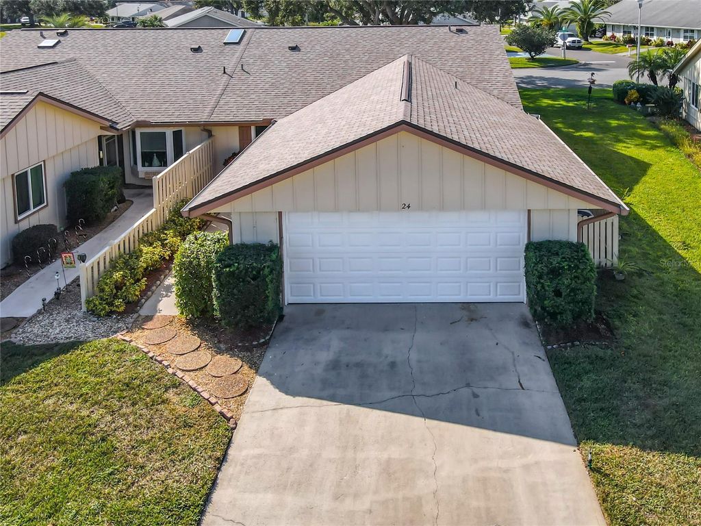 Photo of 24 Stymie Lane, New Smyrna Beach, FL 32168 (MLS # O6363301)