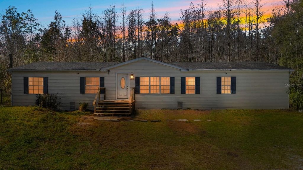 Photo of 10536 Smokie Creek Lane, Lakeland, FL 33809 (MLS # TB8467420)