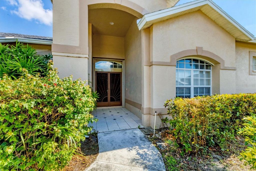 Photo of 7437 Featherstone Boulevard, Sarasota, FL 34238 (MLS # A4672780)