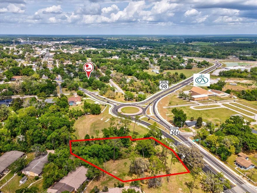 “POSITION FOR GROWTH", this 1.44-acre commercial parcel offers standout visibility on Highway 98 in Dade City. With flexible, commercial-oriented development potential in a designated growth corridor, it’s ideal for small- to mid-scale retail, professional/medical office, or service-based businesses. The site enjoys direct access to downtown Dade City in minutes and a newly constructed roundabout connecting to the Hwy 98 Bypass, simplifying access for customers and employees. Don’t miss this rare opportunity.