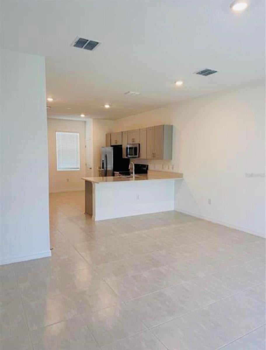 Photo of 2890 Skyline Loop, Kissimmee, FL 34758 (MLS # O6438053)