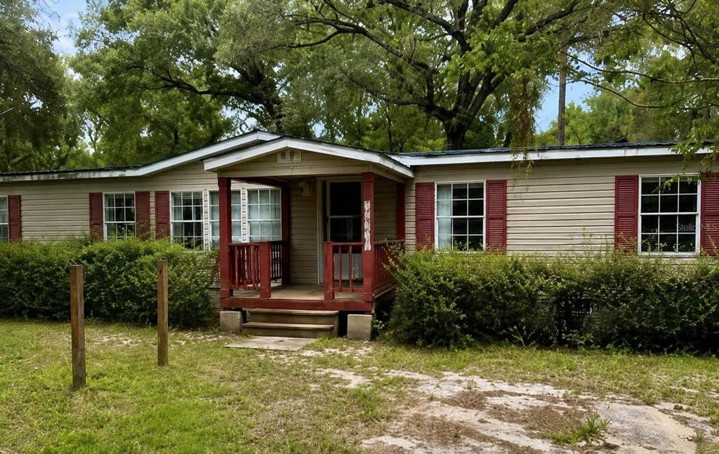 Photo of 15171 NE 154th Lane, Fort Mccoy, FL 32134 (MLS # TB8542182)