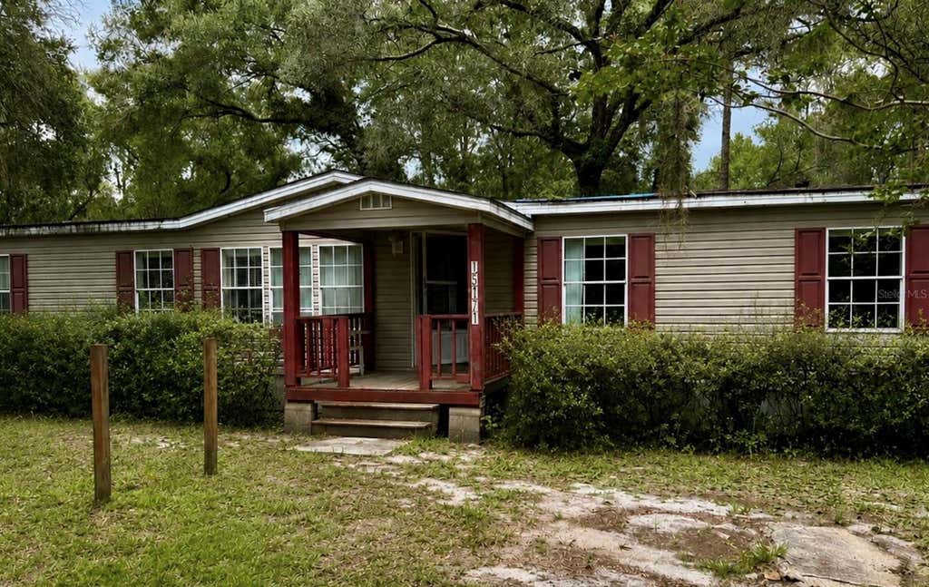 Photo of 15171 NE 154th Lane, Fort Mccoy, FL 32134 (MLS # TB8542182)