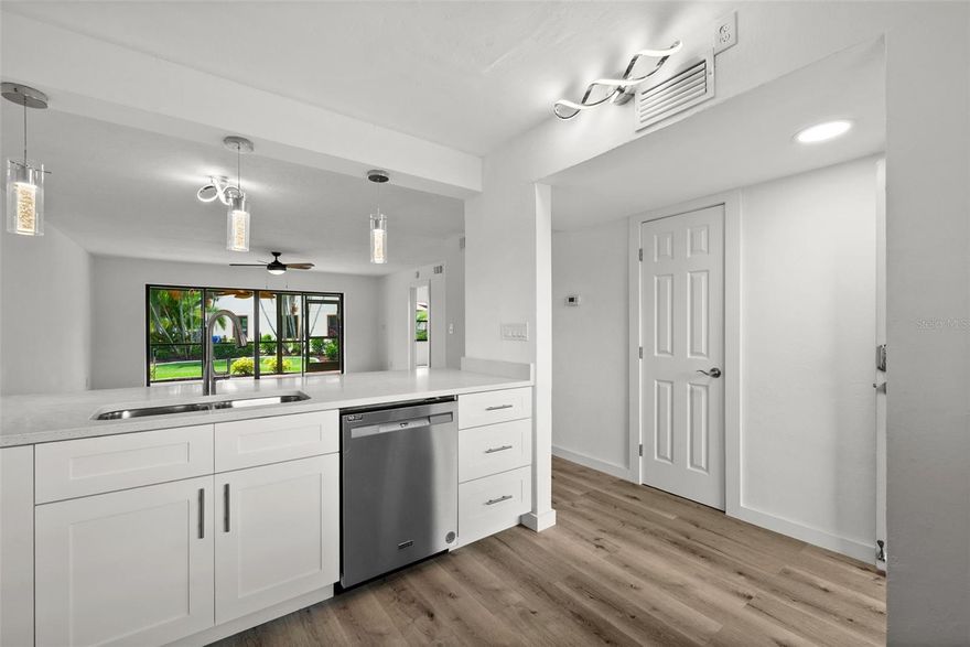 LOWEST PRICE IN BAY POINTE! NEWLY RENOVATED! Welcome to Bay Pointe Yacht & Racquet Club, a hidden gem on the Caloosahatchee River. This beautifully renovated 2-bedroom, 2-bath ground floor condo offers 1,051 sq. ft. of stylish living with AMAZING RIVER and MARINA VIEWS. The lowest-priced condo in the community! The interior has been completely updated with luxury vinyl plank flooring, fresh coastal paint, upgraded electrical, and modern lighting. The remodeled kitchen features soft-close shaker cabinets, quartz countertops, and premium stainless steel appliances, while both bathrooms have been redesigned with contemporary finishes. A NEW AC (2024) provides comfort and peace of mind. The primary suite includes a walk-in closet and Gorgeous water views, with direct access to the south-facing screened lanai, perfect for morning coffee or evening sunsets. Residents enjoy resort style amenities, including a heated pool, fitness center, tennis, pickleball, bocce, kayak launch and fishing pier. Community boat slips with DIRECT GULF ACCESS are available, and you can also buy your own deeded slip, or rent one from a current owner. Surrounded by 27 acres of lush green space, this waterfront community offers a rare blend of natural beauty and convenience, just minutes from shopping, dining, and downtown Fort Myers.