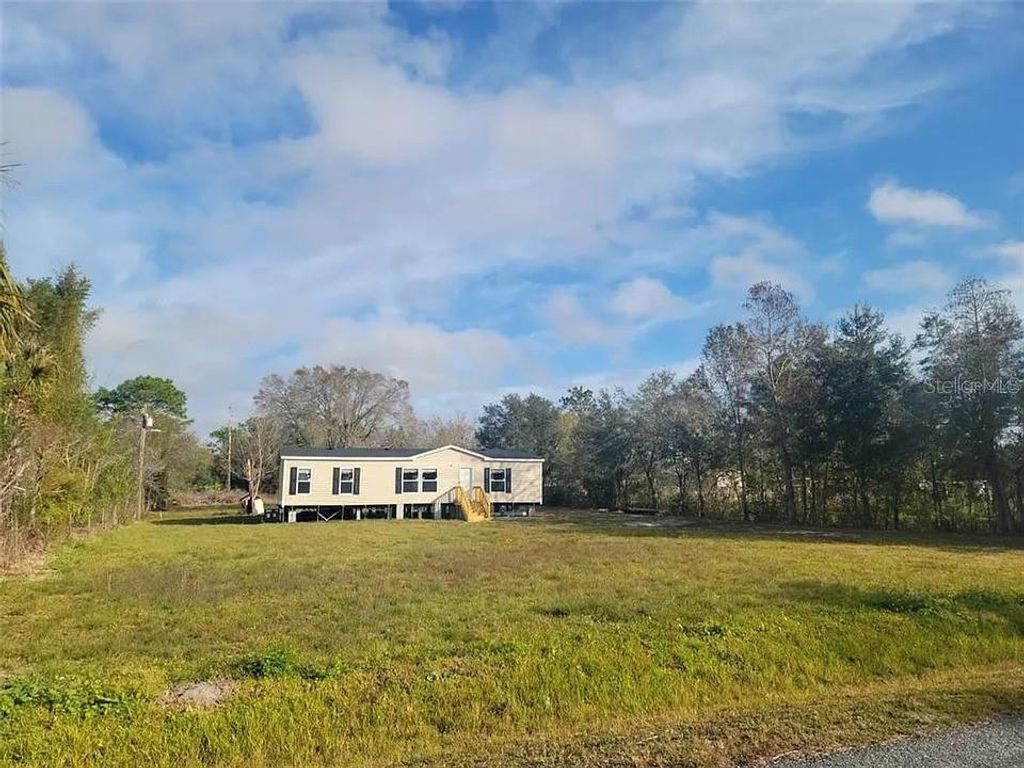 Photo of 9295 Richmond Rd, Saint Cloud, FL 34773 (MLS # S5141860)