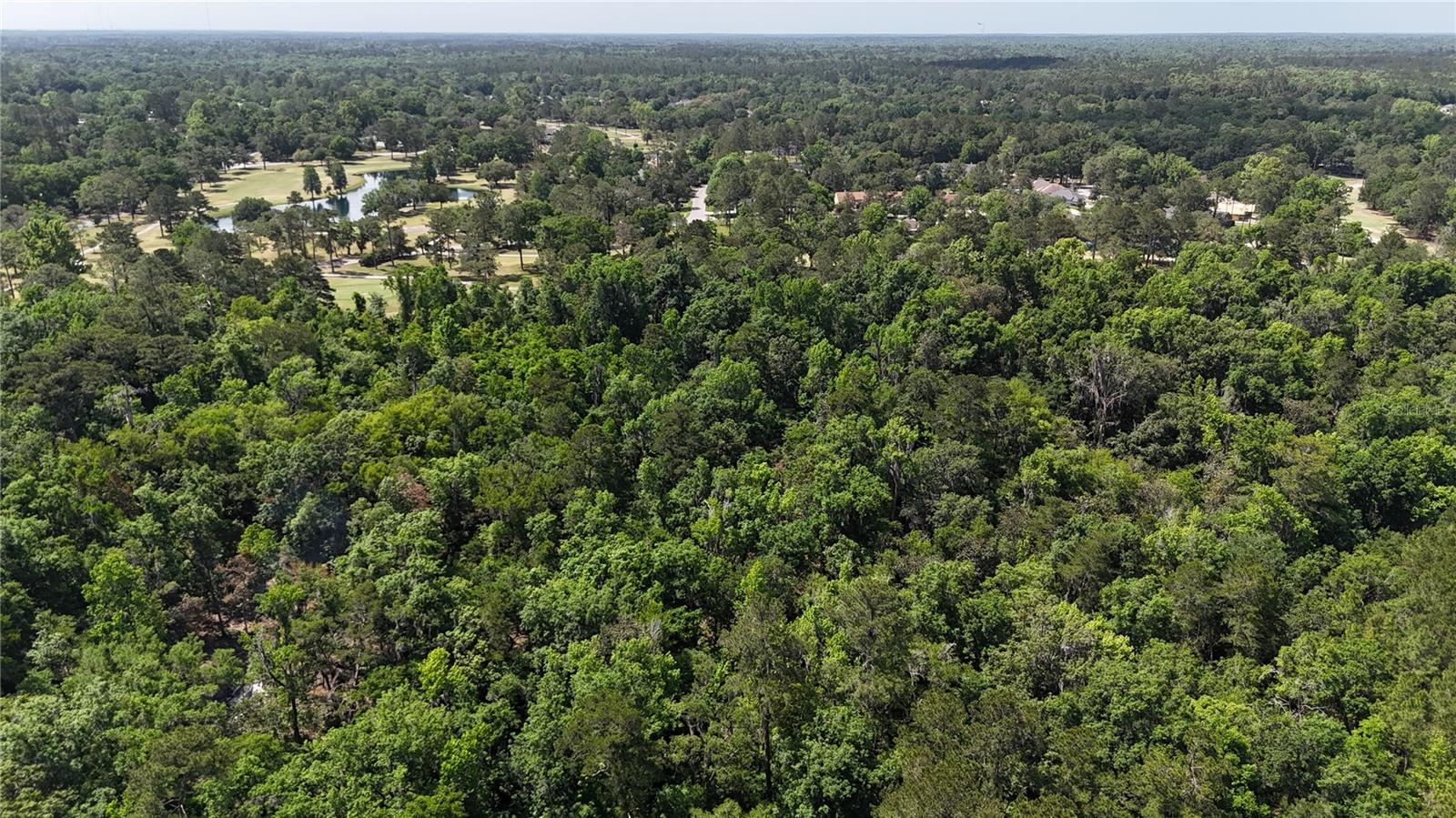 This 16.81-acre property offers a prime opportunity for mixed-use development, boasting approximately 700 feet of frontage along Highway 441 near the entrance to Turkey Creek, a well-established residential community with over 1,100 single-family and multi-family homes. The site features split zoning, providing flexibility for a wide range of uses. The front 8.5 acres are zoned Community Commercial (CC), allowing for high-demand uses such as gas stations, auto services, large-scale retail, hotels, medical and dental clinics, veterinary offices, pharmacies, and convenience stores. The rear 8.31 acres are zoned Agricultural (A) with a future land use designation of Residential Moderate Density, making it well-suited for residential development. Located in a high-visibility, rapidly growing corridor, this property is ideal for a thoughtfully planned mixed-use project that meets both commercial and residential demand. In the interim, benefit from steady income generated by five occupied rental units on the property, which include two mobile homes, one single-family residence, and one duplex.