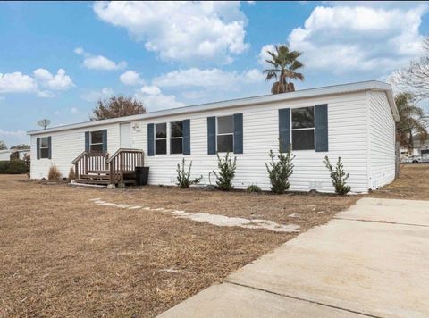 Photo of 13877 County Road 109f, Lady Lake, FL 32159 (MLS # G5108220)