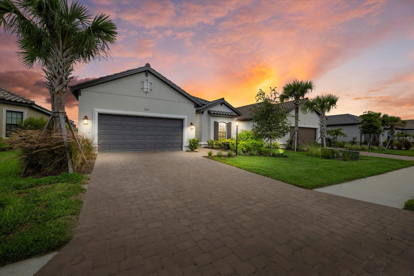 *GOLF MEMBERSHIP INCLUDED/ GOLF DEEDED HOME* Discover the ultimate in luxury living at this exceptional RARE 4 bed, plus den, 3 bath,
with POOL and 3 car tandem garage Lazio floor plan home in Esplanade at Azario, Lakewood Ranch's most coveted golf community, meticulously
crafted by Taylor Morrison! Step into your dream lifestyle and tee off immediately with no waitlist on this breathtaking property. With this home
comes an exclusive golf membership, giving you direct access to the community's 18-hole golf course and the opportunity to tee off immediately
with no waitlist. Savor the serene lake right from your massive private extended lanai pool area, offering sweeping lake views that will leave you
in awe. This stunning pool and spa is surrounded by travertine tile. Your master suite is your very own personal oasis, complete with an en suite
boasting dual sinks and an expansive walk-in shower, designed for ultimate relaxation and rejuvenation. Prepare to be captivated by the
stunning kitchen, featuring stainless steel appliances and a generous oversized island, perfect for entertaining loved ones or whipping up
delicious meals. The open floor plan invites warmth and encourages effortless interaction between family and friends. Azario goes above and
beyond, offering an array of state-of-the-art amenities tailored to your every desire. The community features a pro shop & Bunker bar, where
golfers can unwind and enjoy a refreshing beverage after a round. The Aqua driving range provides an excellent space for practice, while the
culinary center is coming soon which will cater to every taste bud. Stay active with pickleball and tennis courts, or relax in the spa and wellness
center. The fitness center keeps you in tip-top shape, while on-site activities directors ensure there's always something fun and engaging for
residents of all ages. Walking trails, community gardens, fire pit area, and meeting and activity center complete the picture of an idyllic lifestyle.
Embrace the unparalleled maintenance-free luxury of Azario and immerse yourself in a world of endless possibilities. Come home to your very
own piece of paradise and live the life you deserve!