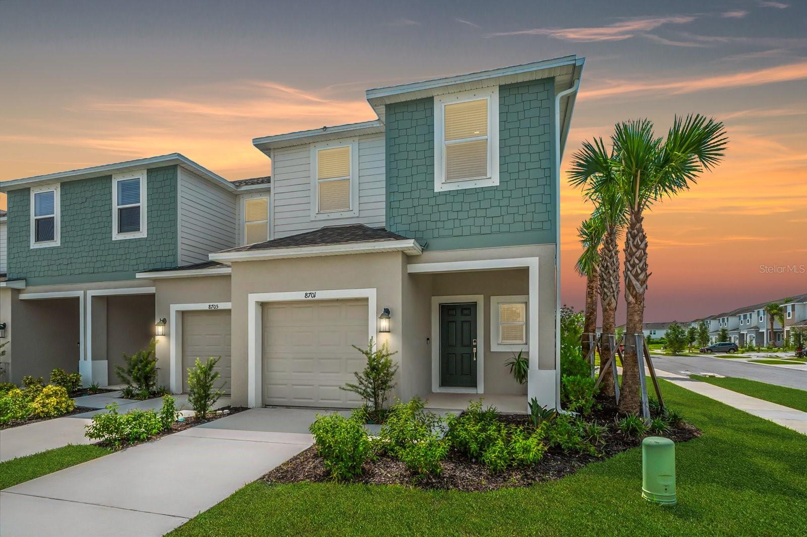 Gorgeous end-unit Marigold townhome in Skye Ranch featuring the largest floor plan available, offering extra space both upstairs and down. This spacious three-bedroom, two-and-a-half-bath layout is thoughtfully designed with a large open-concept living and dining area, perfect for entertaining or relaxing. The kitchen is a showstopper with an oversized quartz island, stainless steel appliances, recessed lighting, a walk-in pantry, and beautiful tile flooring throughout the first level. Double patio doors off the living room lead to a covered lanai and a private backyard with a grassy area and peaceful lake view to the left, creating a serene setting for morning coffee or evening sunsets. The one-car garage offers direct access into the home, with a convenient half bath downstairs for guests. Upstairs, the Marigold’s signature flex space offers endless possibilities, whether used as a sitting area, reading nook, home office, or display space for artwork. The primary bedroom provides a lovely second-story water view and includes dual sinks, a walk-in closet, and a private bath. Two additional bedrooms share a full bathroom with a tub and shower combo. As an end unit on a larger lot, the home enjoys added outdoor space and a charming garden area. Skye Ranch is known for its beautiful mature landscaping, winding sidewalks, and connection to nature with over 25 miles of trails and preserve views. Community amenities include two heated pools with cabanas and gas BBQ grills, plus immediate access to Turner Park with sand volleyball, basketball and tennis courts, a playground, baseball and soccer fields, lacrosse, two dog parks, and a catch-and-release fishing pier. Skye Ranch Elementary opens this fall with a focus on science, technology, engineering, agriculture, and math, and is located right within the community. Skye Ranch is tucked just off Clark Road for a direct 10-mile drive to Siesta Key, making it easy to enjoy the beach while living in one of Sarasota’s most desirable new communities. Come experience the best of both worlds: new construction surrounded by nature, with easy access to Siesta Key, shops, and restaurants. Call today to schedule your private showing.