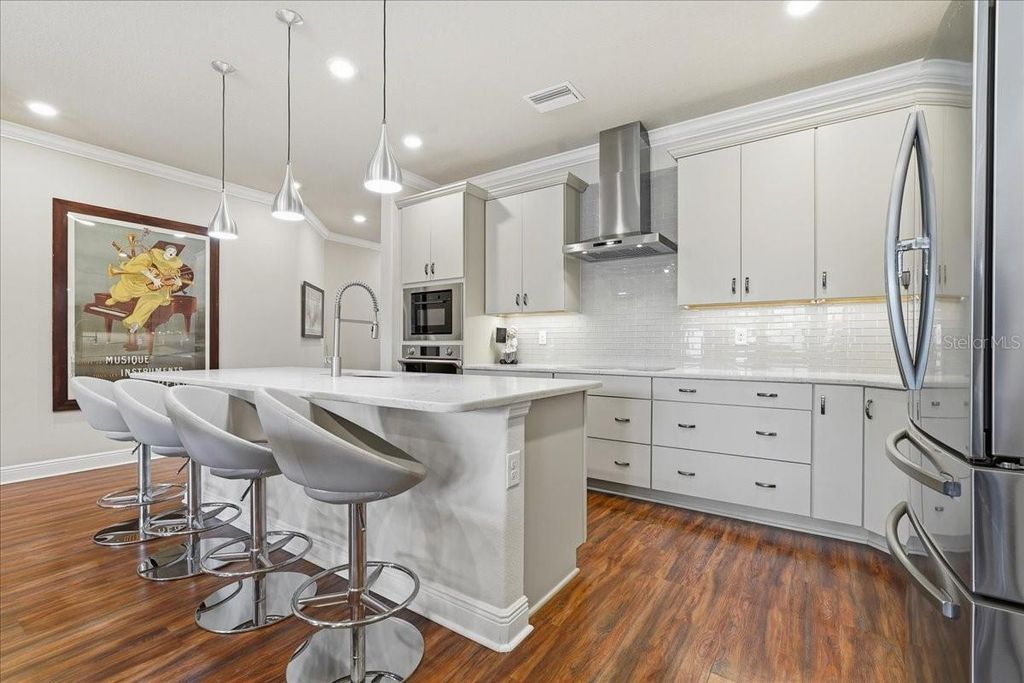 Photo of 603 Ozona Village Drive, Palm Harbor, FL 34683 (MLS # TB8496444)