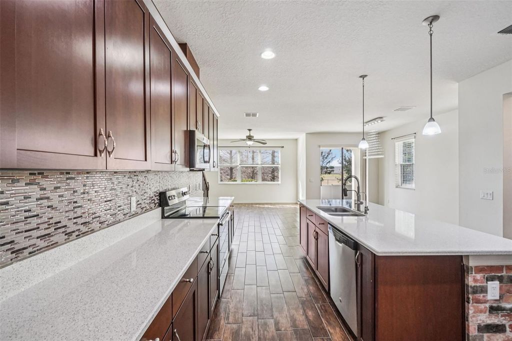 Photo of 11540 Crowned Sparrow Lane, Tampa, FL 33626 (MLS # TB8462255)