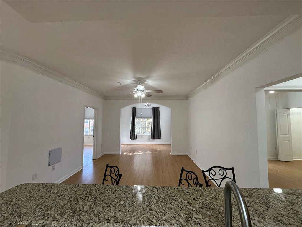 Photo of 12843 Madison Pointe Circle E #201, Orlando, FL 32821 (MLS # O6391058)