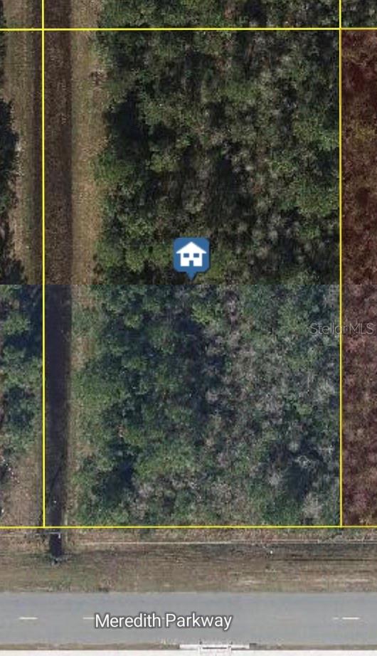 Build your dream home on this exceptional vacant lot in Wedgefield Cape Orlando Estates, one of East Orlando’s most sought-after communities! This expansive lot offers the perfect blend of privacy and natural beauty, nestled among custom-built homes and surrounded by serene Florida landscape. Enjoy the peace and space of country living with convenient access to major highways, the Orlando International Airport, Lake Nona Medical City, UCF, and the Space Coast beaches. Whether you’re looking to build now or invest for the future; this is an outstanding opportunity in a rapidly growing area. Don’t miss your chance to own a piece of paradise in Wedgefield!