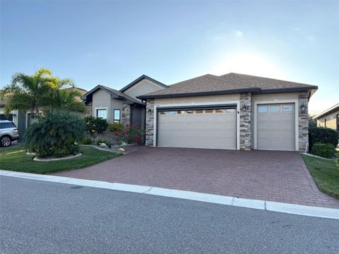 Photo of 1142 Sawgrass Drive, Winter Haven, FL 33884 (MLS # TB8460347)