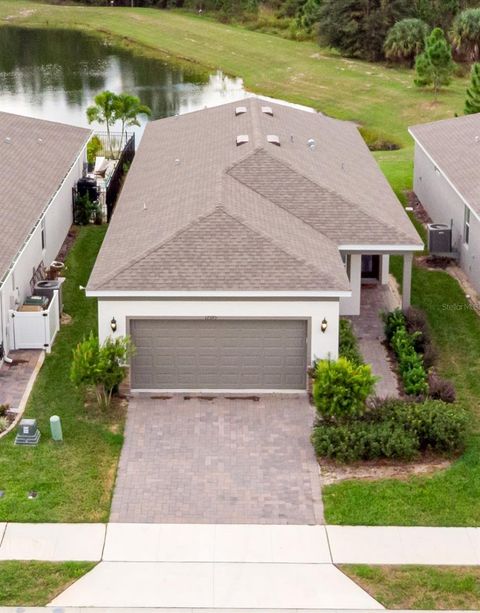 Photo of 17395 Saw Palmetto Ave, Clermont, FL 34714 (MLS # O6351867)