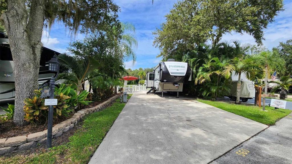 Photo of 560 Waterway Drive, River Ranch, FL 33867 (MLS # TB8302626)