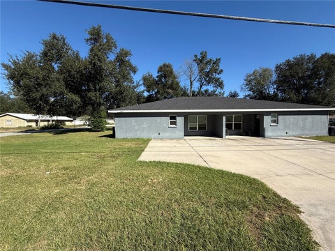 Photo of 5675 NW 6th Place #1, Ocala, FL 34482 (MLS # OM734607)