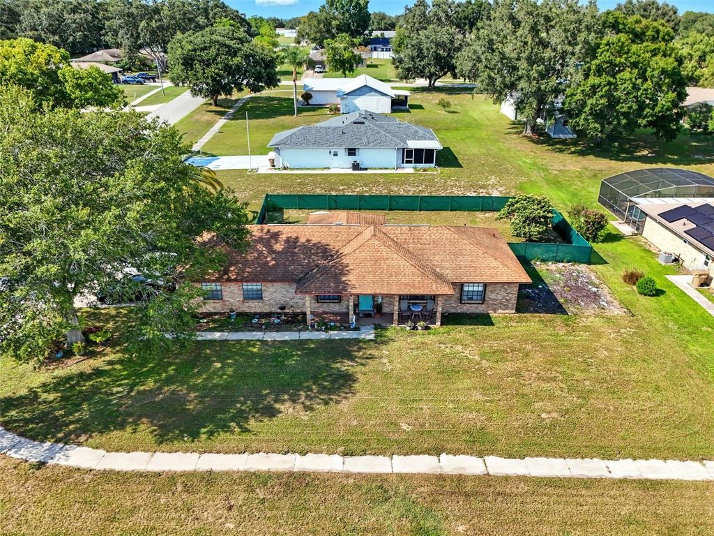 Photo of 12545 Glen Abbey Drive, Grand Island, FL 32735 (MLS # G5101466)