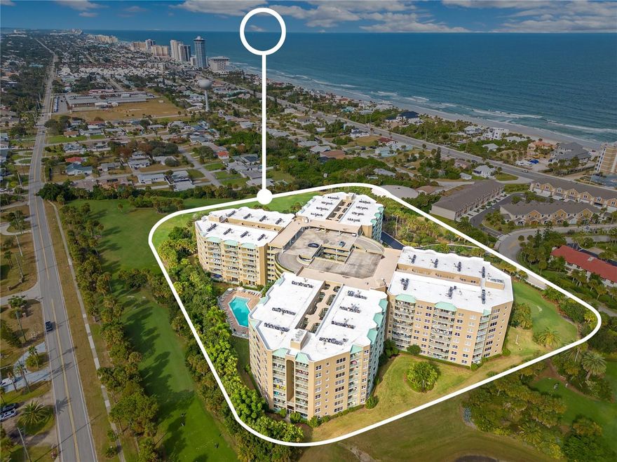Welcome to the convenient beach life, only found at The Oceans Cloverleaf North Condos! Situated on the peninsula between the Atlantic Ocean and the beautiful Halifax River. You'll absolutely fall in love with this 7 floor condo boasting 2 bedrooms, and 2 bathrooms as well as vinyl wood flooring and PLANTATION SHUTTERS Throughout. The entry hallway opens to the kitchen nook with floor to ceiling mirrors, giving this space an elegant feel as it leads into the open and roomy kitchen with stainless steel appliances, UPDATED CABINETS, lots of counter and cabinet space, and a breakfast bar. Enjoy quick and easy meals in the dinette area and spacious living room offering a triple door slider that overlooks the stunning nature preserve! The master suite boasts carpet flooring, lots of room to move, as well as a private bathroom en suite with stand alone shower, soaking tub and gorgeous dual vanities. You'll love the sliding glass doors in your master suite that allow lots of natural light to filter through. Second bedroom is also very roomy with lots of closet space, while the additional full bathroom offers a full shower/tub combo. Inside utility hook-up, another wonderful feature of this amazing condo. The amenities are endless when it comes to Cloverleaf North! With an outdoor pool, as well as an indoor, heated pool with separate room for the spa, a full fitness center, an all-wood sauna, a library with computer, and a community area, the perfect spot to host unforgettable gatherings! Each condo has an assigned, covered parking space, storage room, bike storage room, as well as bicycle/motorcycle parking available. Did we mention the par-3 golf course ON GROUNDS! This Coastal Lifestyle Condo is close to Publix, Restaurants, Shopping, Community Center, Parks, Even Dog Parks for those Furry Friends, the Airport, the Speedway, Pickleball, the BEACH, the RIVER, places of worship, Tennis. This is a calm and easy beach living at its finest and it's available for you to tour today!