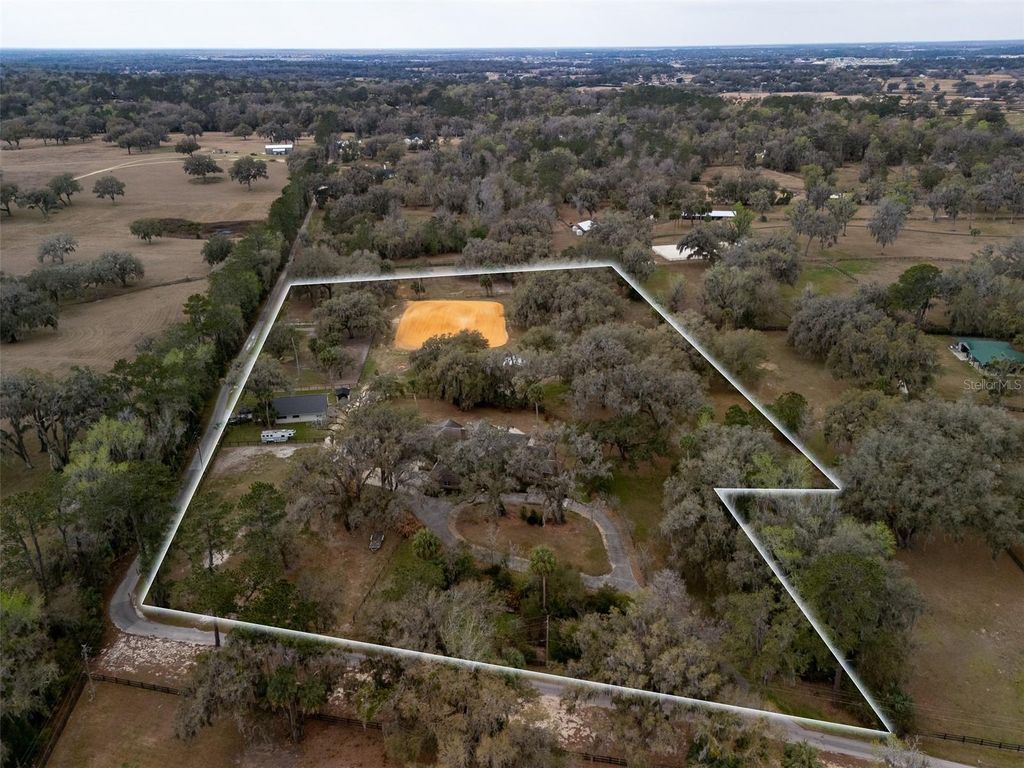 Photo of 4986 SW 7th Avenue Road, Ocala, FL 34471 (MLS # OM719205)