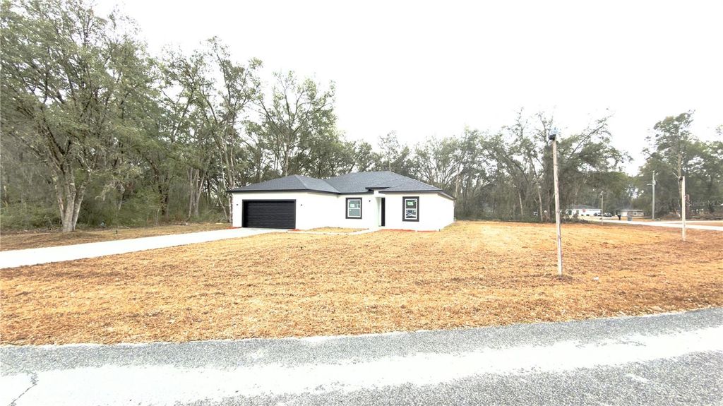 Photo of 4104 SW 130th Place, Ocala, FL 34473 (MLS # O6392466)