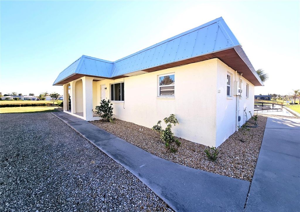 Photo of 122 Boundary Boulevard #A, Rotonda West, FL 33947 (MLS # S5145103)