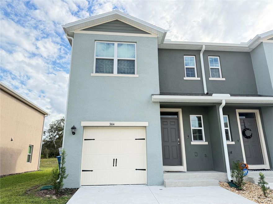 Experience modern living in this beautifully designed open plan 3 bed, 2.5 bath townhome in Horse Creek, Davenport. This corner townhome with no rear neighbors features 1,463 sq ft of living space offers ceramic tile flooring, Quartz countertops, and stainless steel appliances and a washer and dryer. Many upgrades including ceiling fans and bathroom cabinets. Enjoy the comfort of a bright and airy spacious master bedroom with walk-in closet and dual sink master bathroom.
Enjoy the perks of smart home technology, a one car garage, energy efficient construction, and access to a sparkling community pool, all within a peaceful neighborhood setting.
Move in ready, this home blends modern elegance, low maintenance living, and resort style amenities in one perfect package.
Whether you’re a first-time home buyer, investor, or snowbird, this turnkey townhome located near shopping, dining, and theme parks delivers the Florida lifestyle you’ve been looking for.
Schedule your showing today!