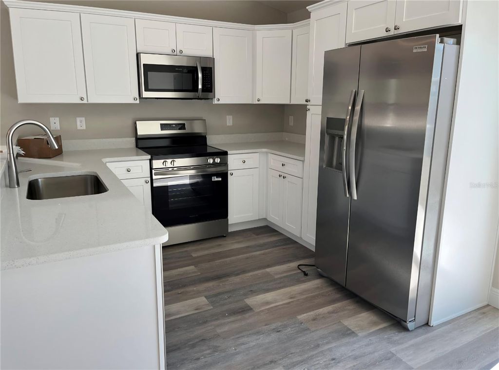 Photo of 10304 SE 126th Lane, Belleview, FL 34420 (MLS # OM718948)